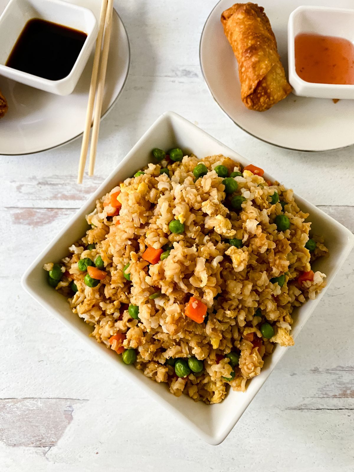 bowl of fried rice on wood table