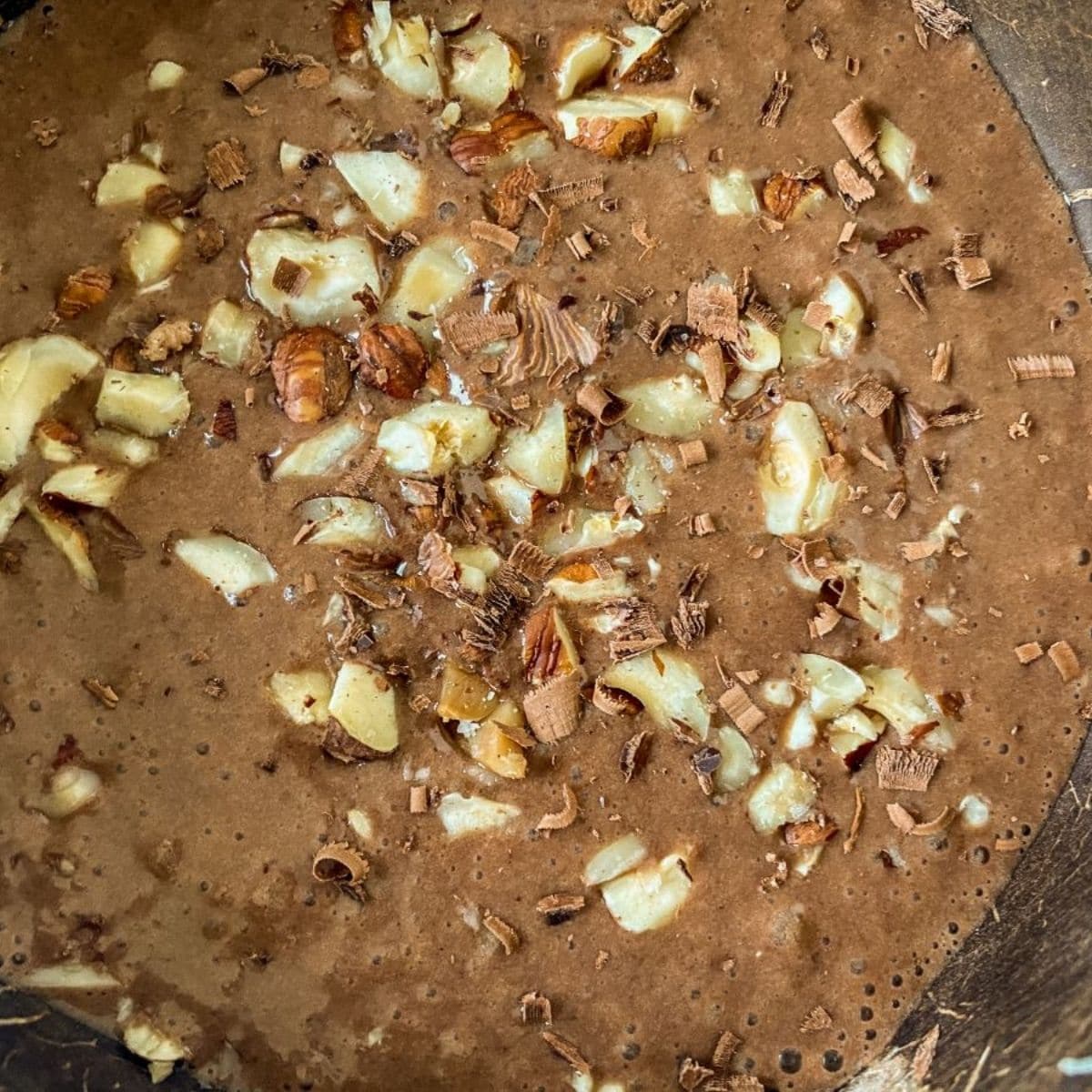 hazelnuts pieces on top of chocolate smoothie