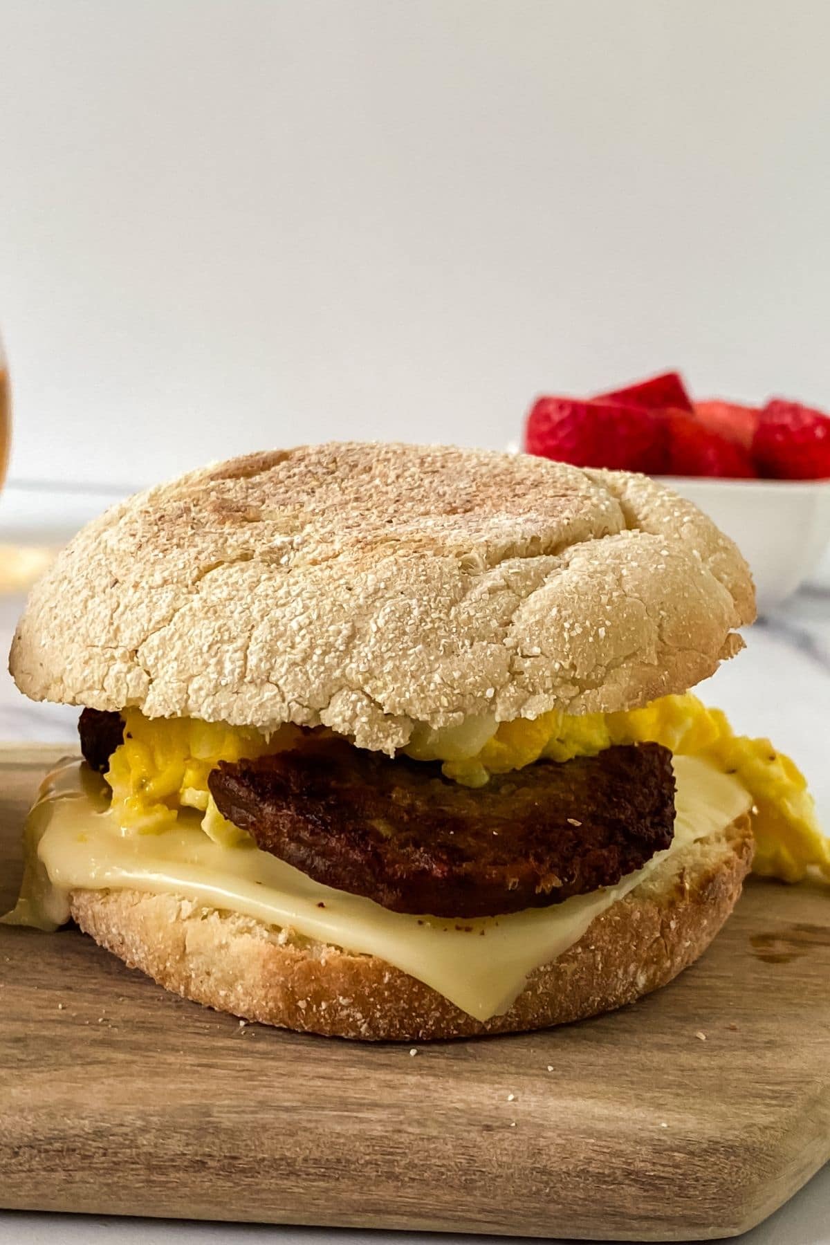 sausage mcmuffin on wooden board