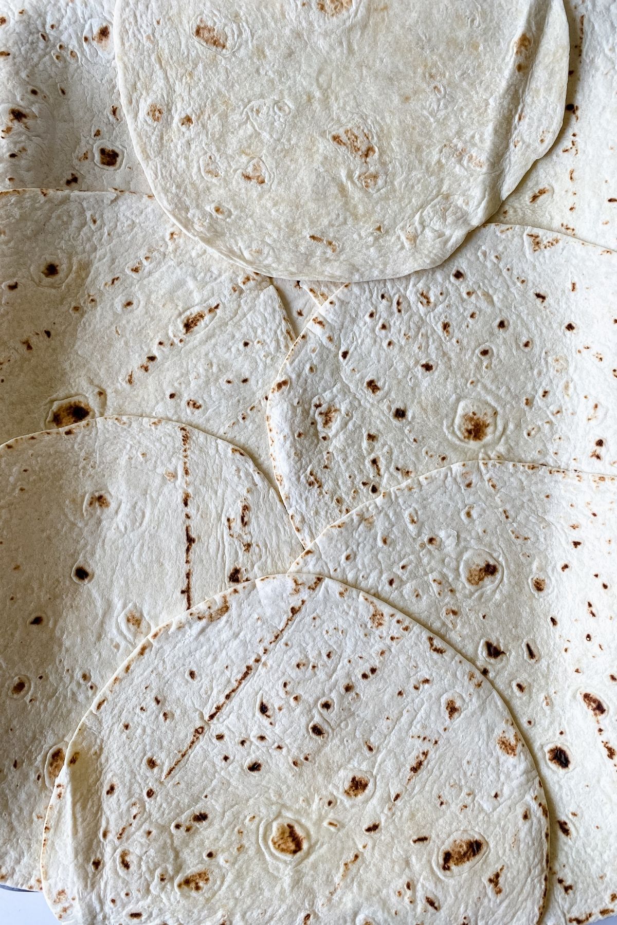 sheet pan covered with tortillas