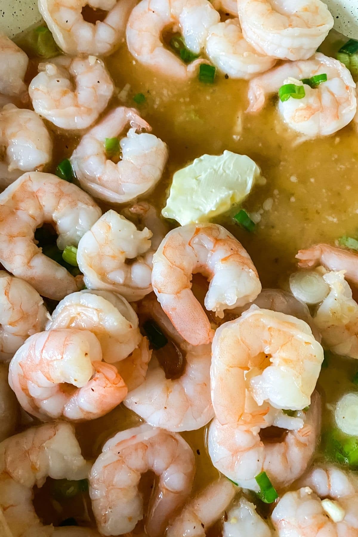 shrimp in skillet with sauce