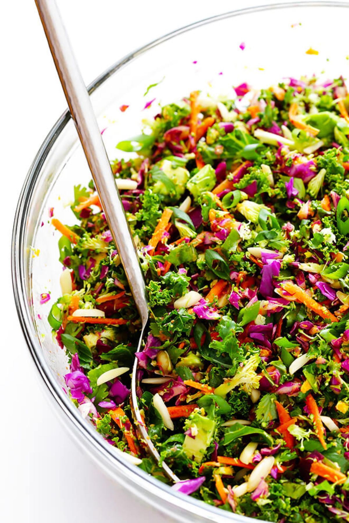 glass bowl of chopped salad with kale and red cabbage