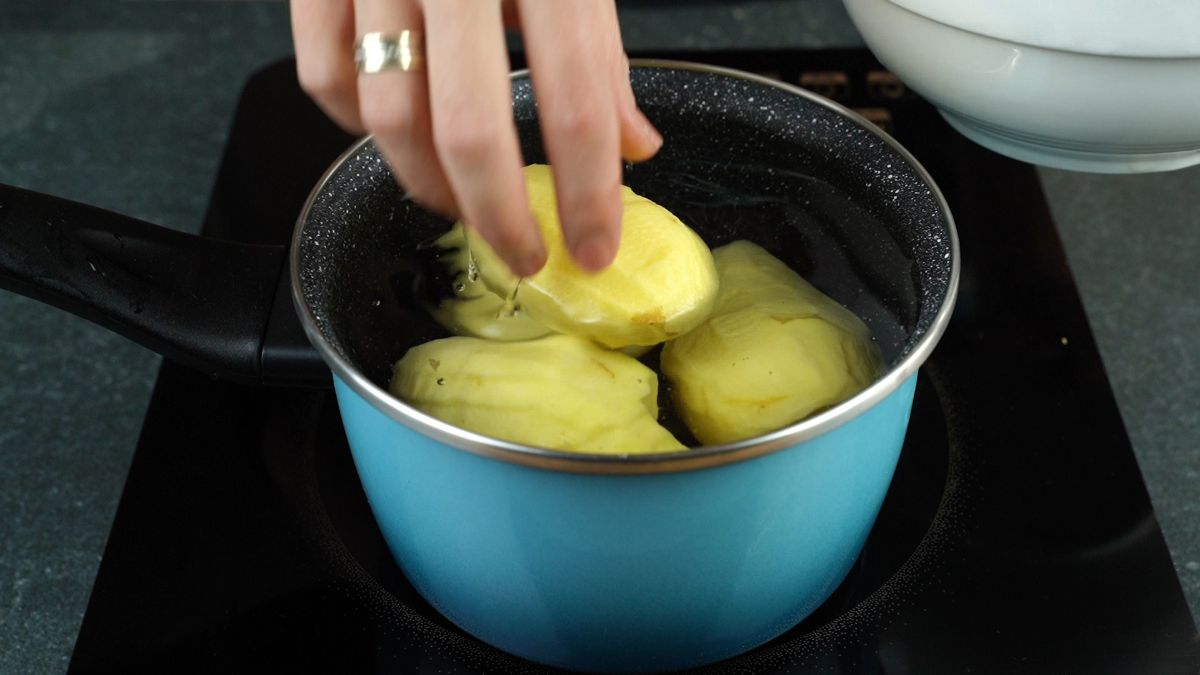 blue saucepan of potatoes