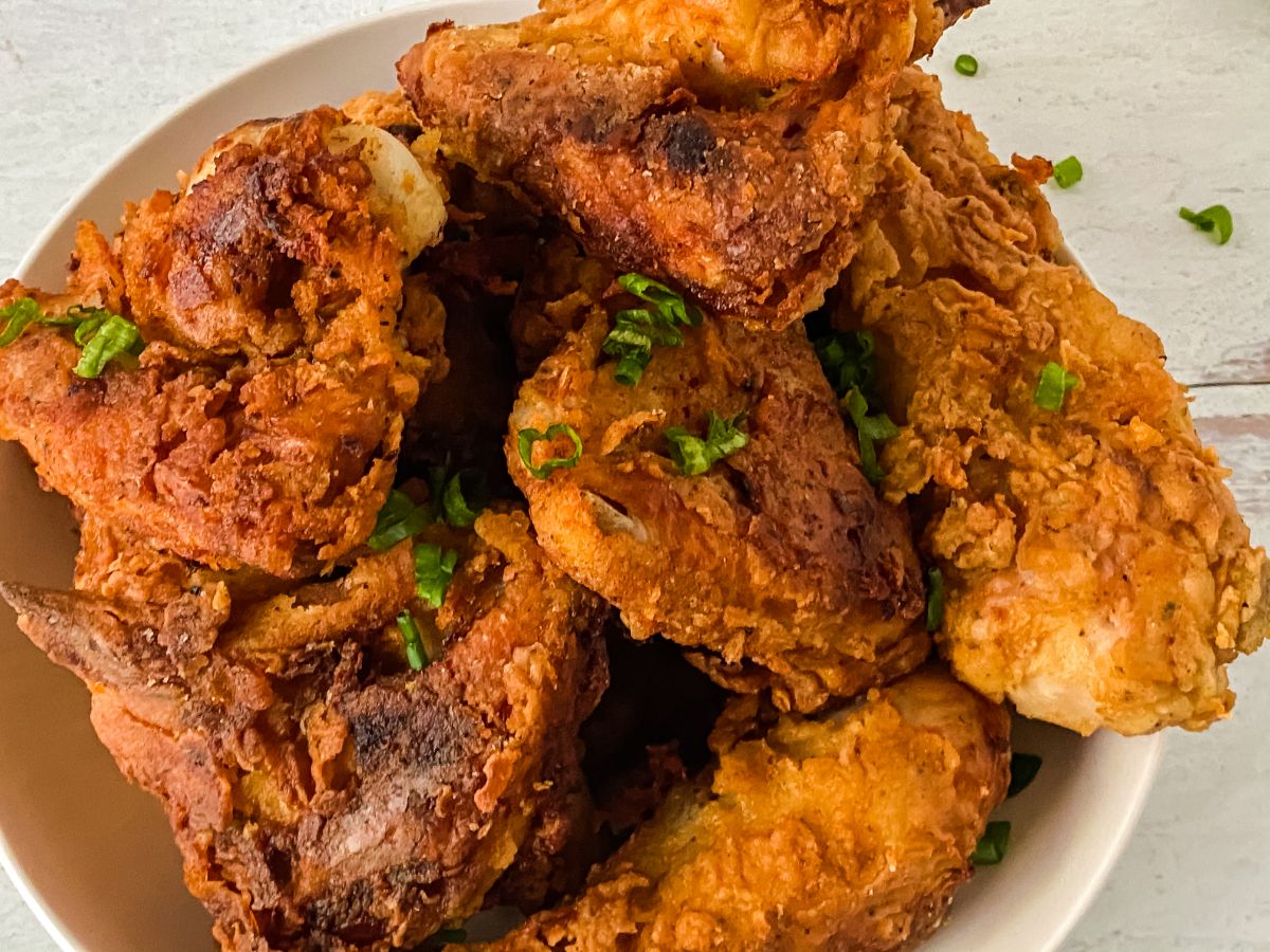 close up picture of fried chicken in white bowl