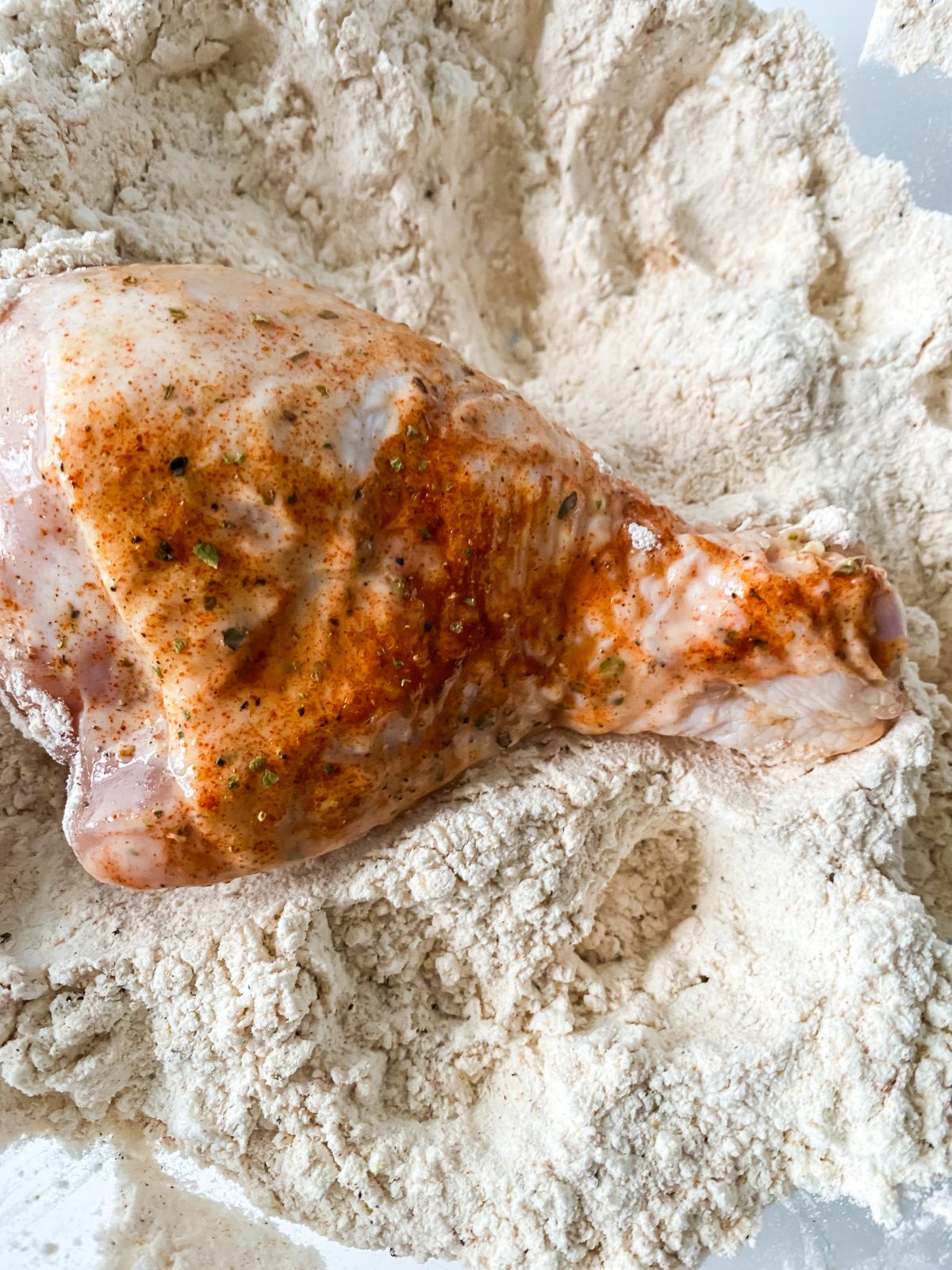 chicken leg dredged in flour