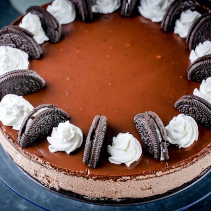 top of chocolate cheesecake with cookies and whipped cream