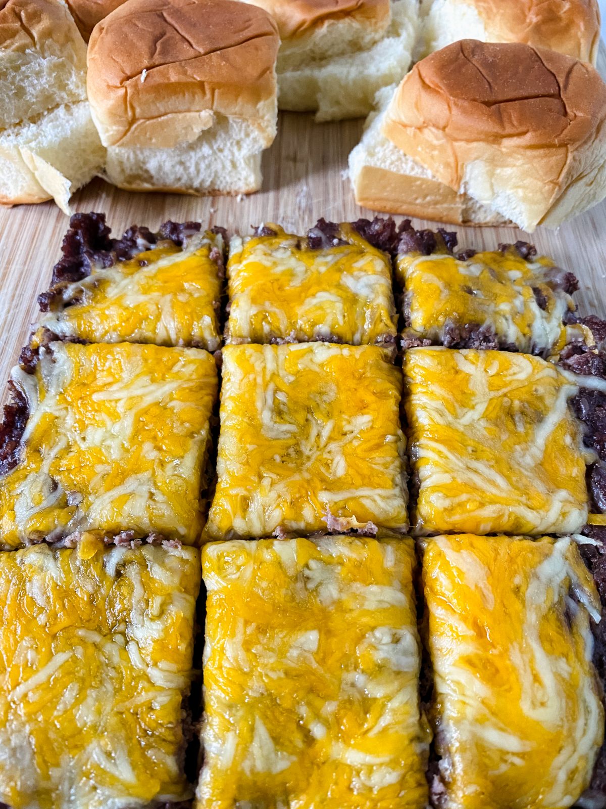 hamburger with cheese square cut into squares