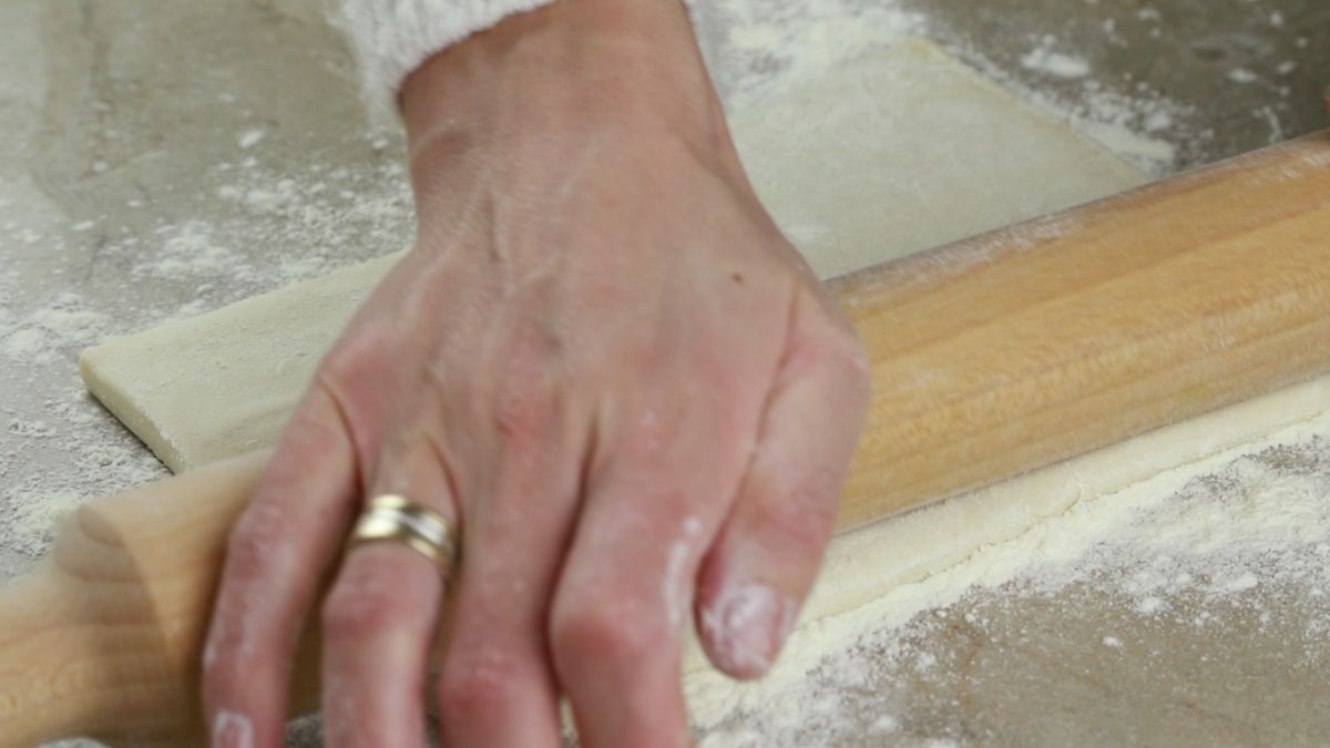 hand rolling dough