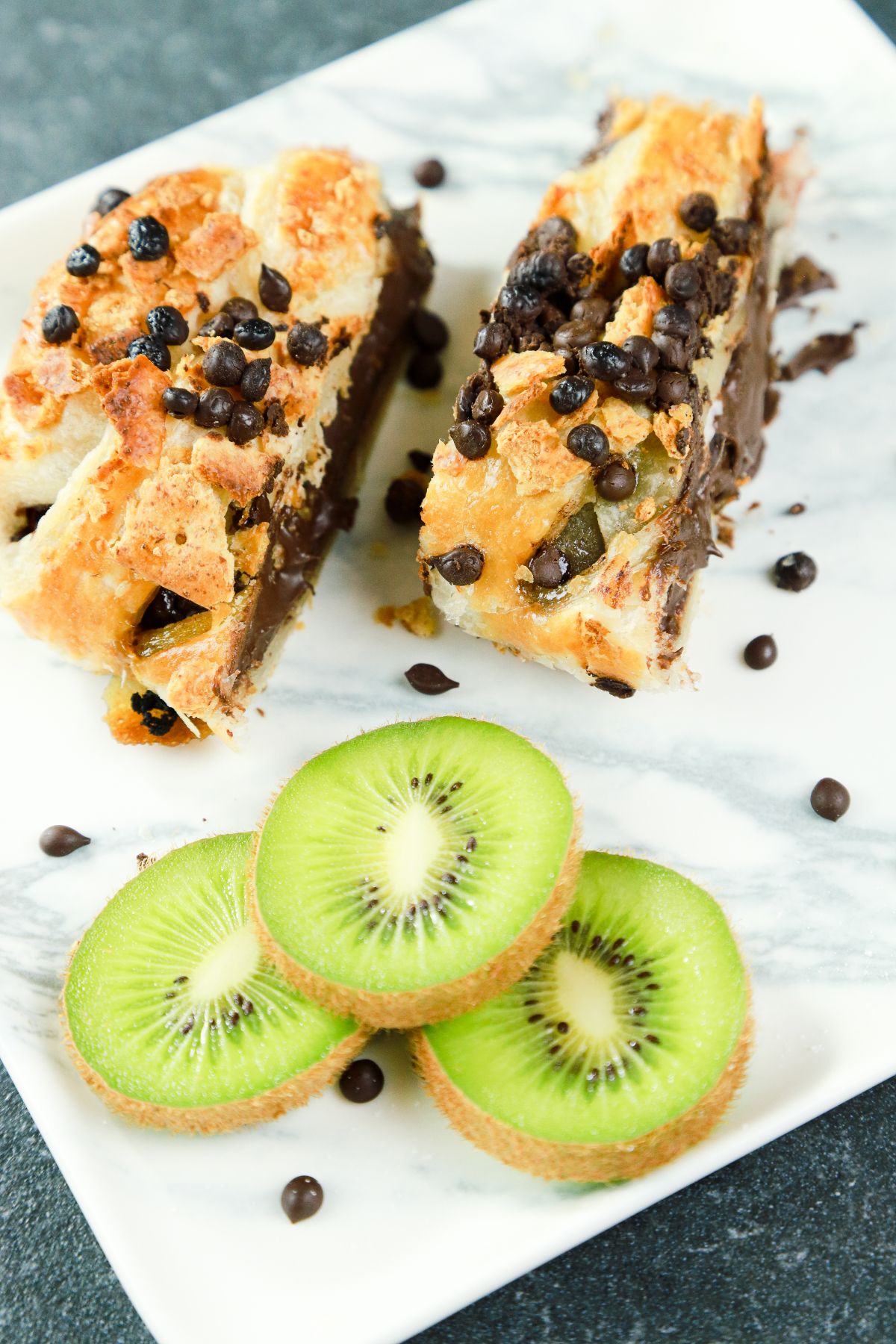 kiwi and chocolate bread on white plate