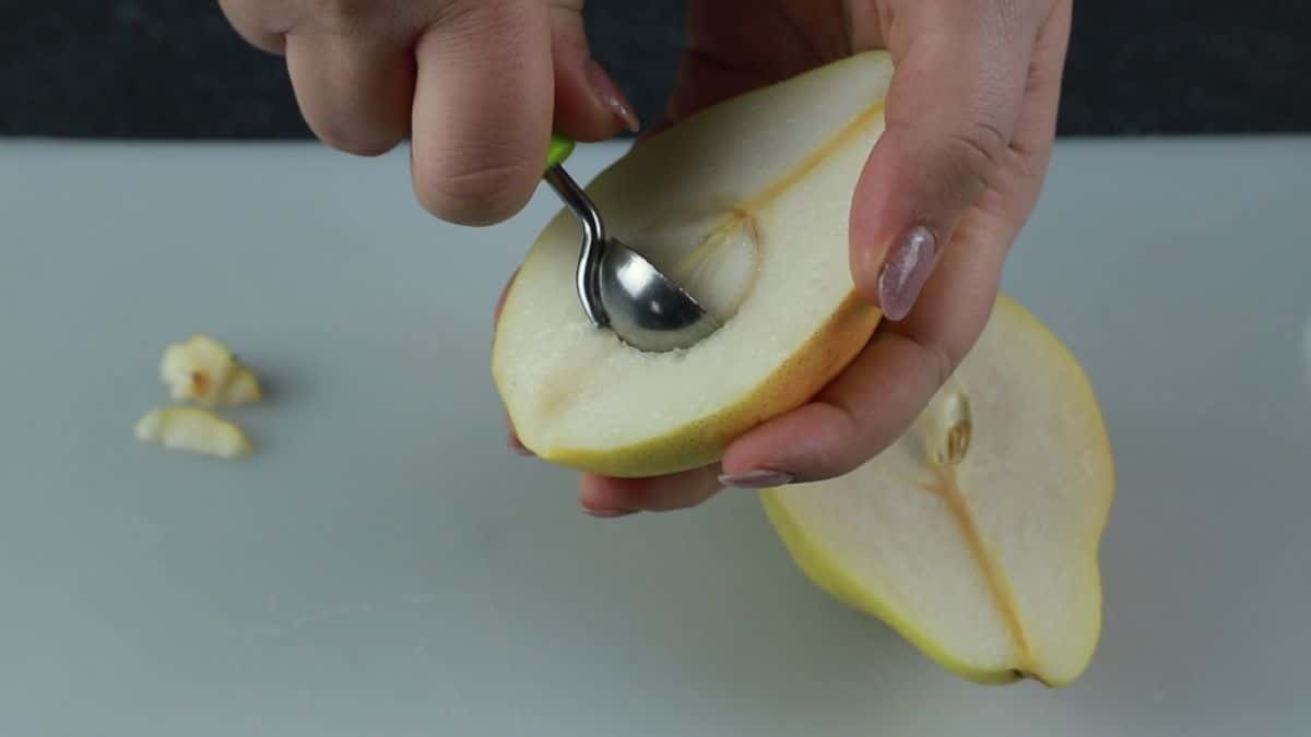 melon baller removing core of pear