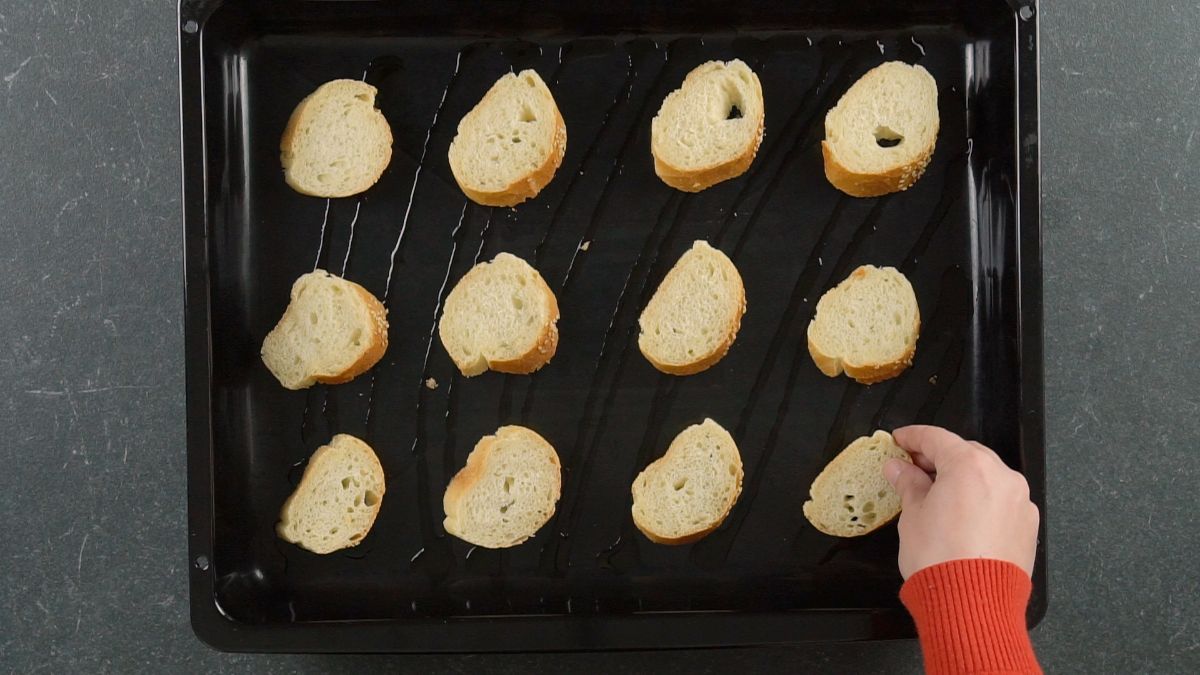 black baking sheet with bread slices