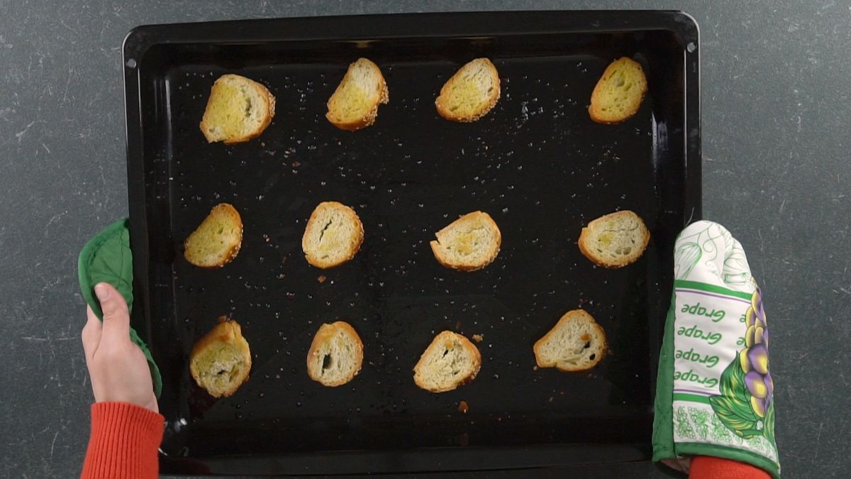 toasted bread on black baking sheet