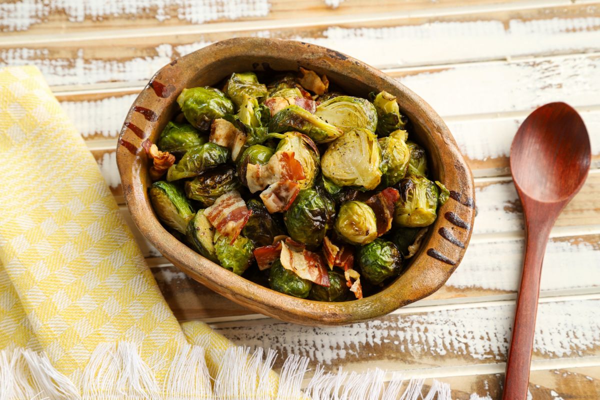 brown bowl of brussels sprouts with bacon