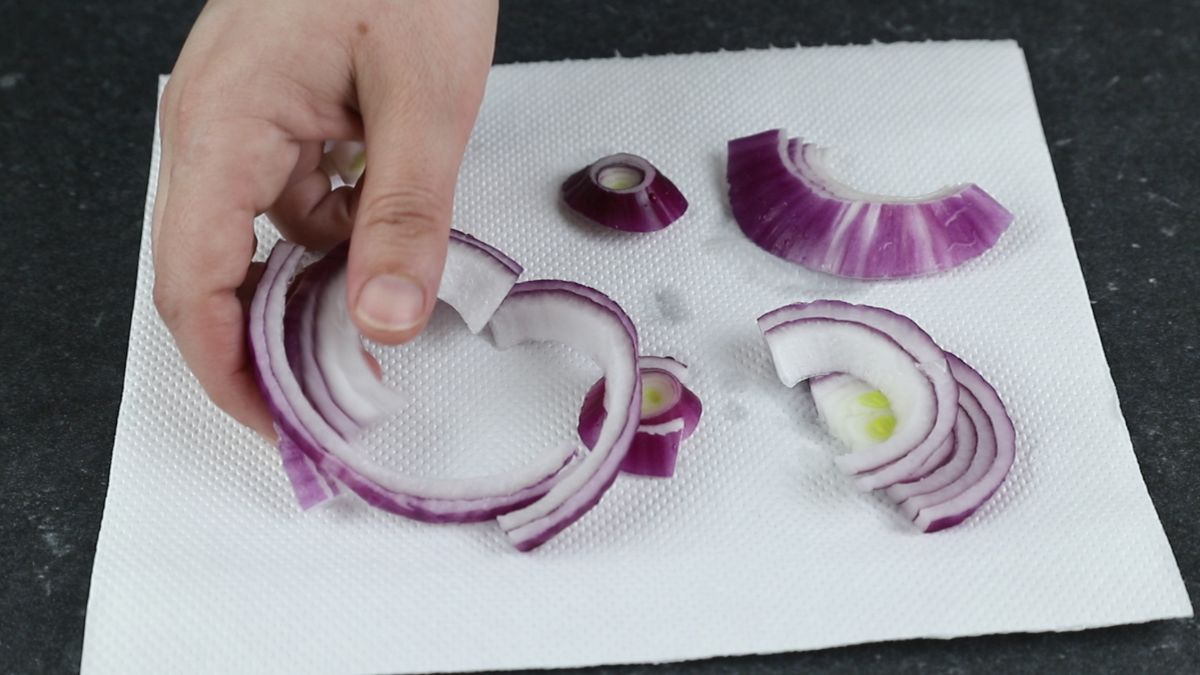 red onions laying on paper towel
