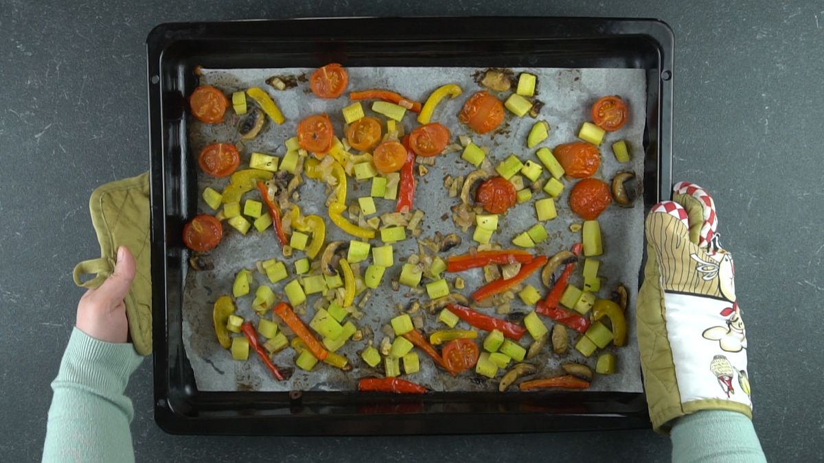roasted vegetables on baking sheet