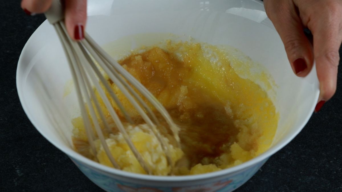 whisk in bowl of butter and sugar