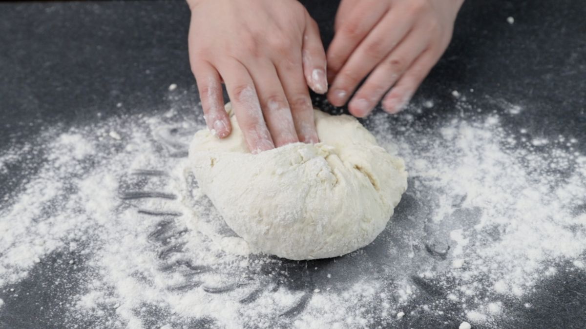 dough on table with extra flour