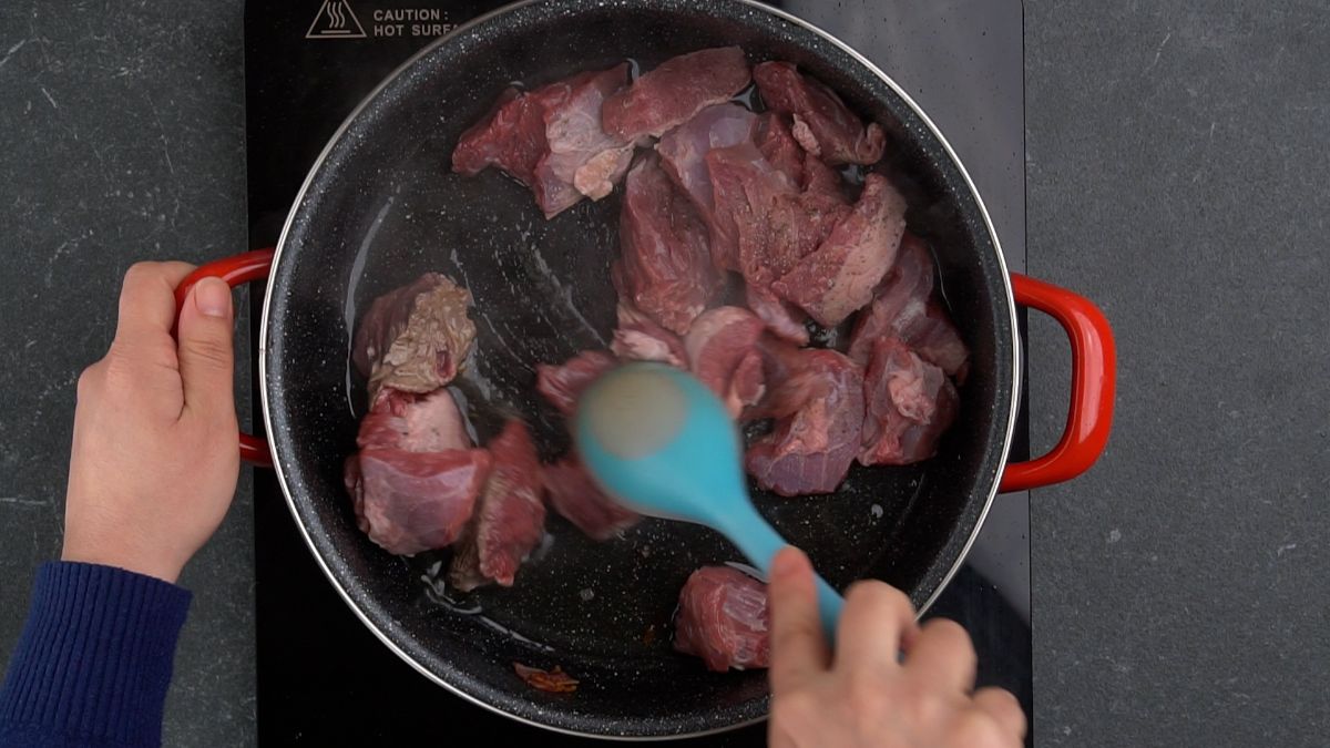 stew meat being cooked