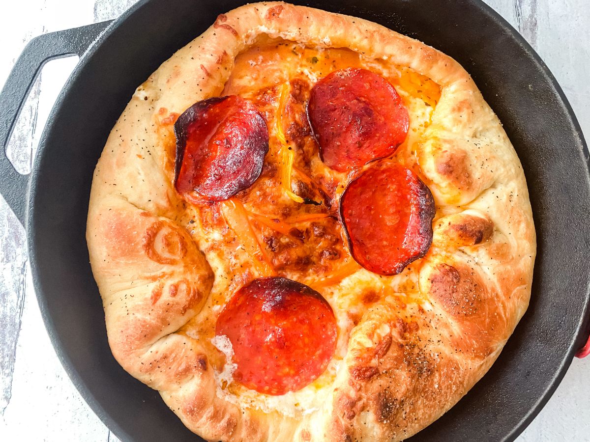cooked pizza in skillet