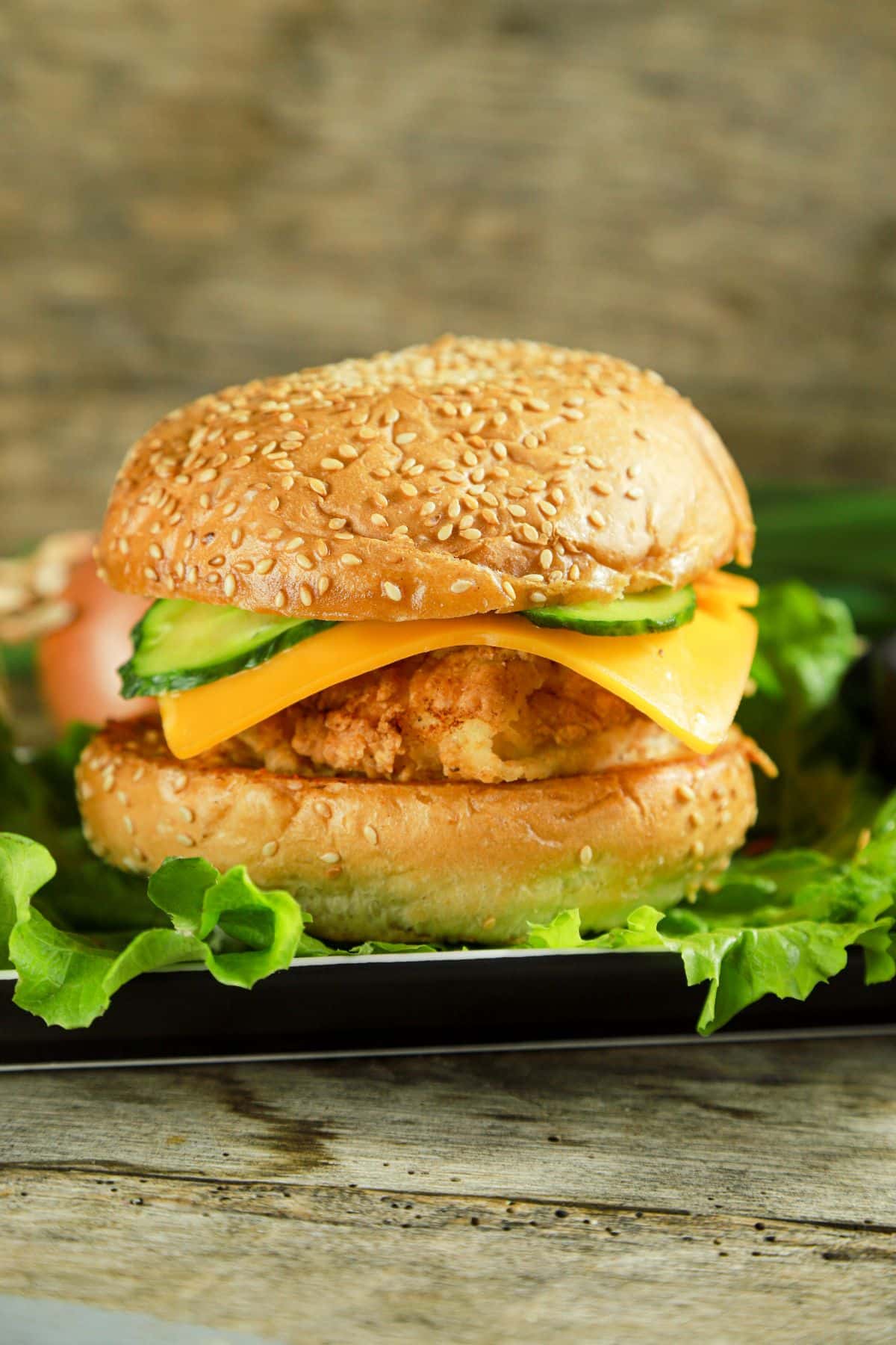 pickle and cheese on crispy chicken burger