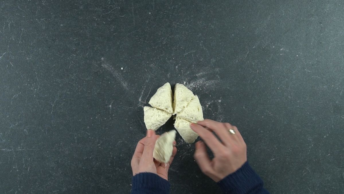 ball of dough cut into pieces