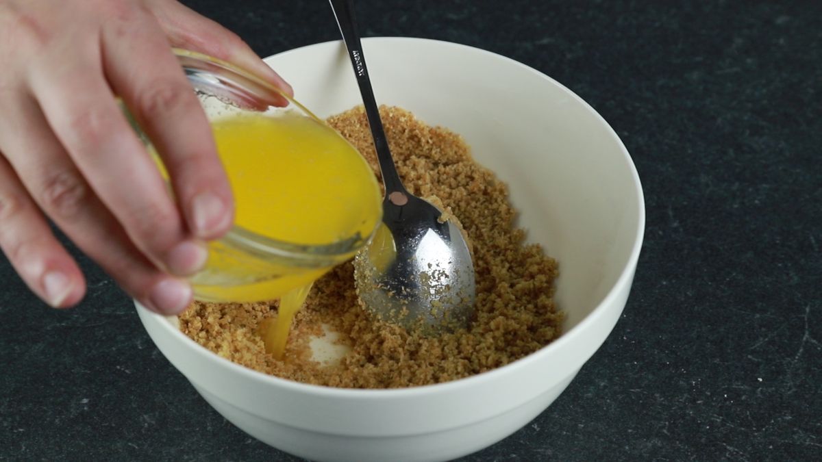 cookie crumbs being mixed in bowl