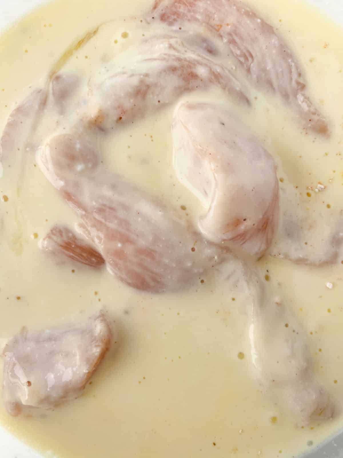 chicken in bowl of milk