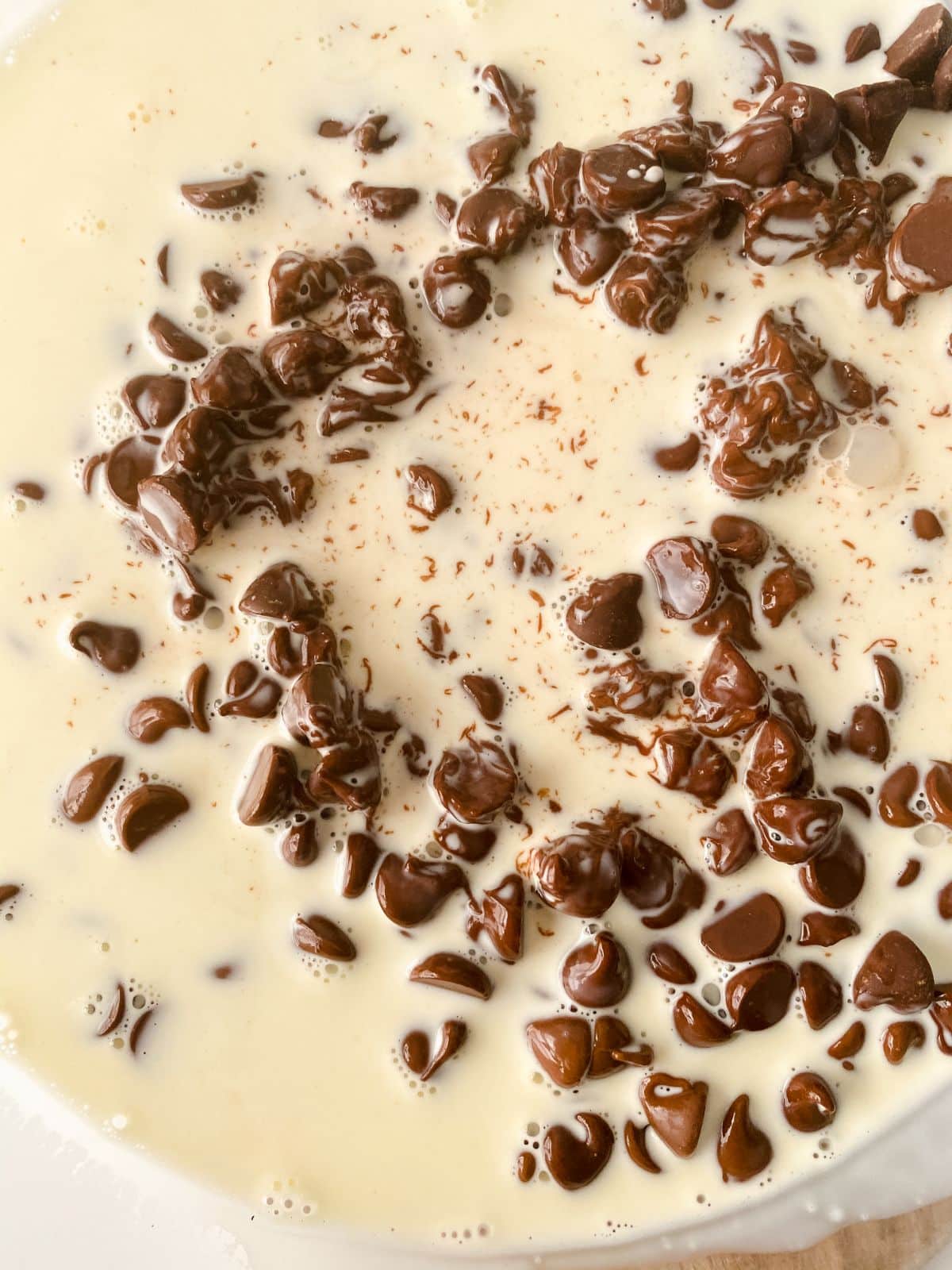 cream and chocolate chips in bowl