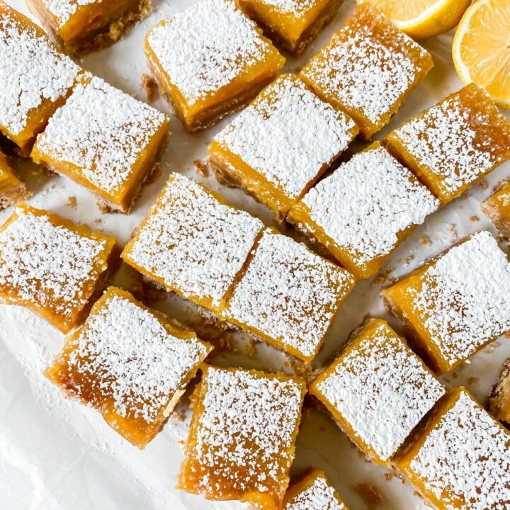 square of lemon drop bars topped with powdered sugar