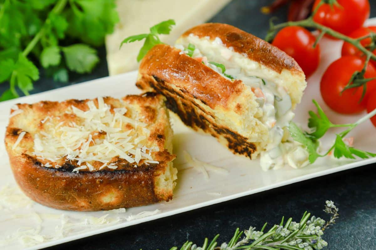 toasted potato bread with cheese and slaw