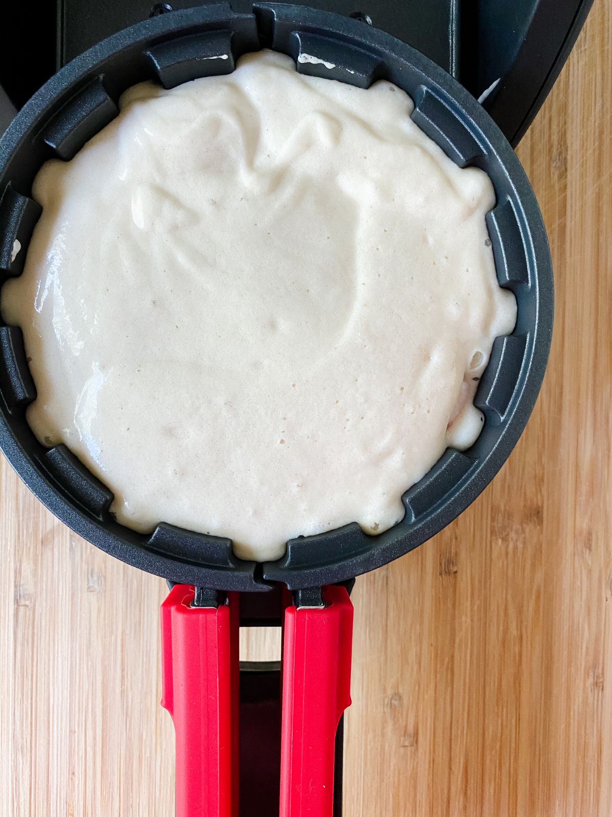 waffle batter in waffle maker