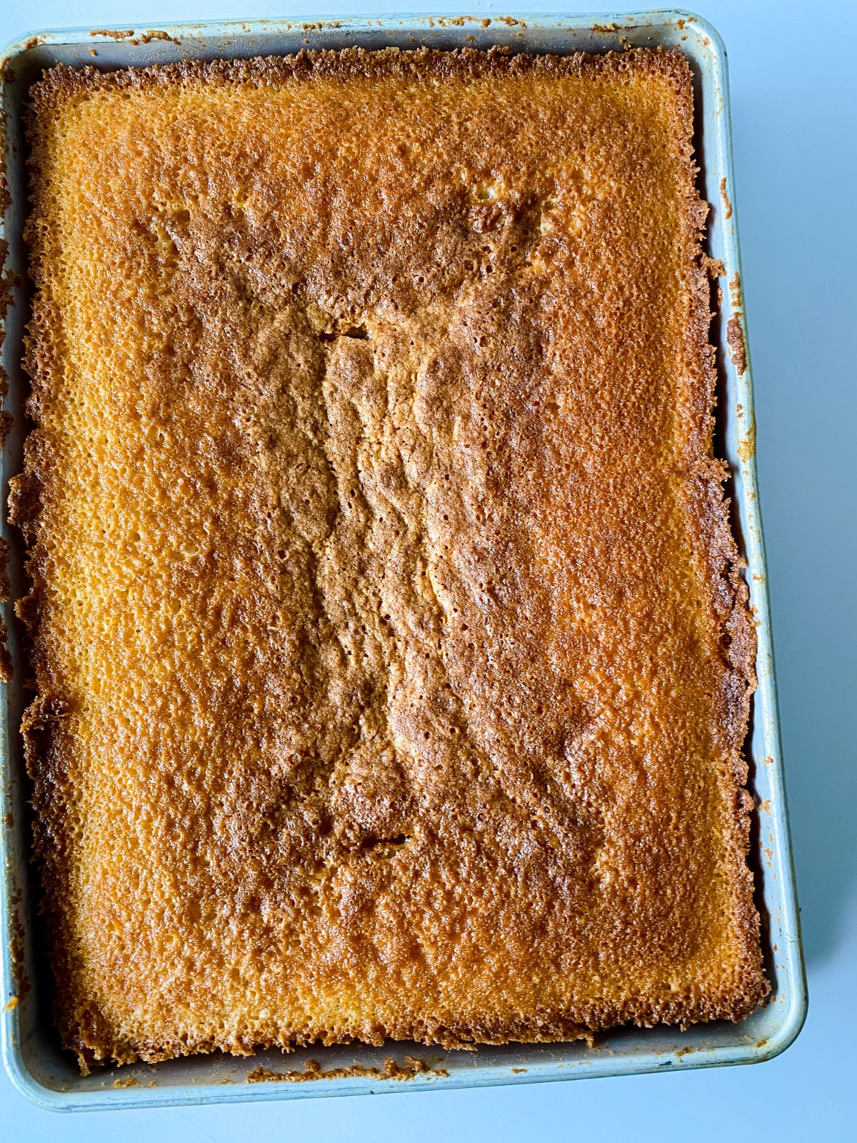 cooked sheet cake in pan