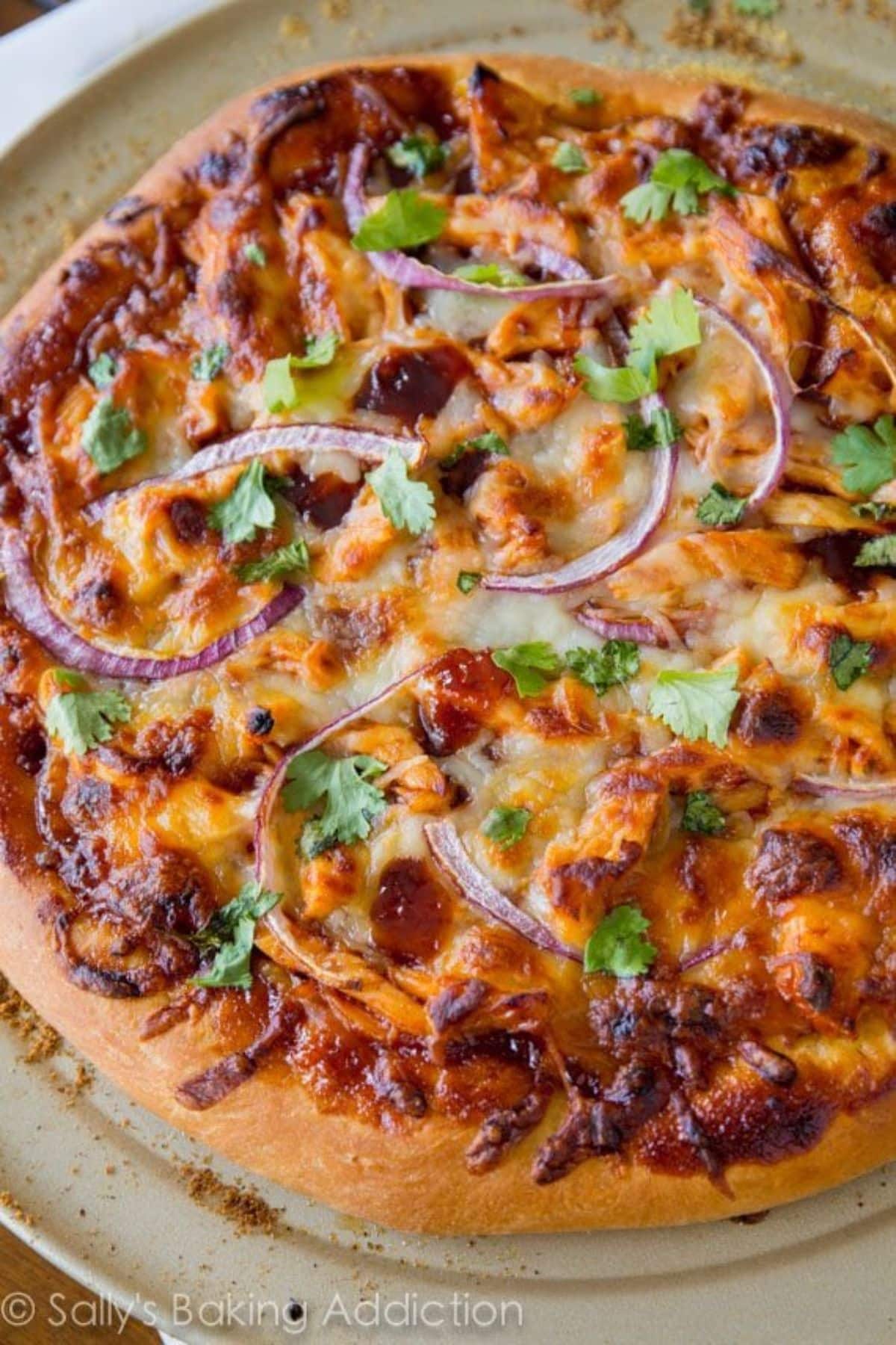 BBQ Chicken Pizza on a white tray.
