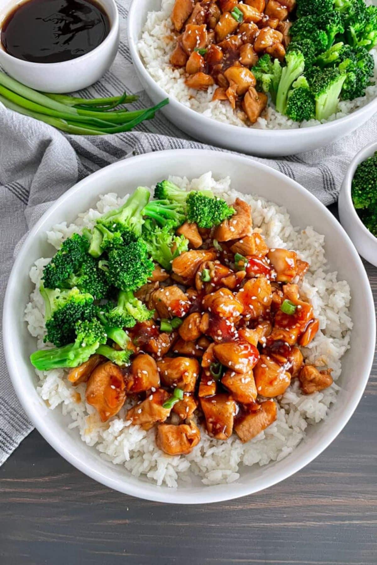 Teriyaki Chicken Bowls on a wooden table.
