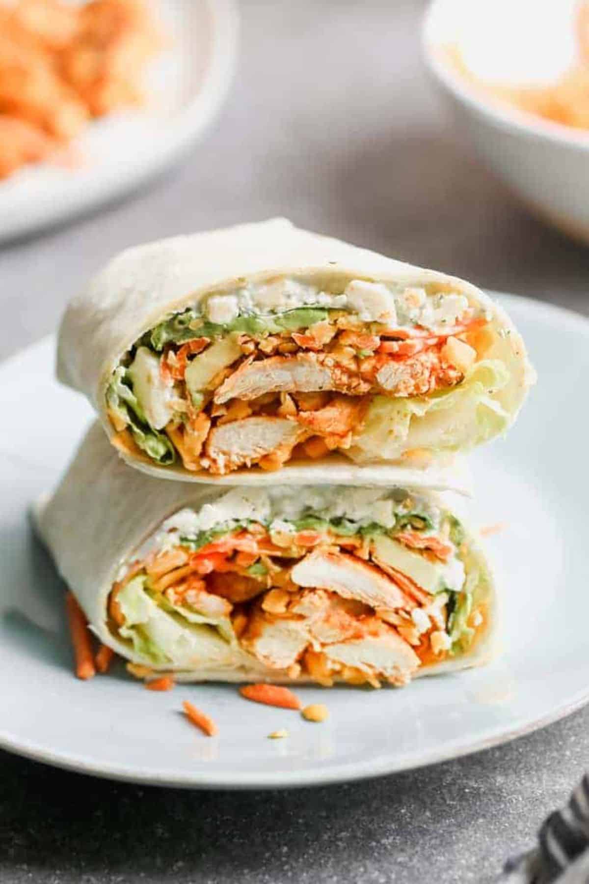 Buffalo Chicken Wraps on a white plate.