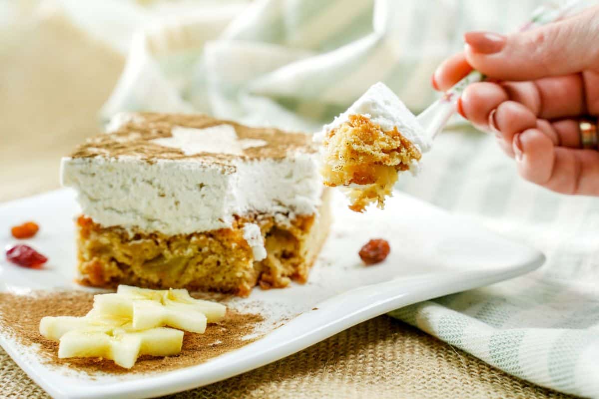 apple blondie cheesecake with bite taken out