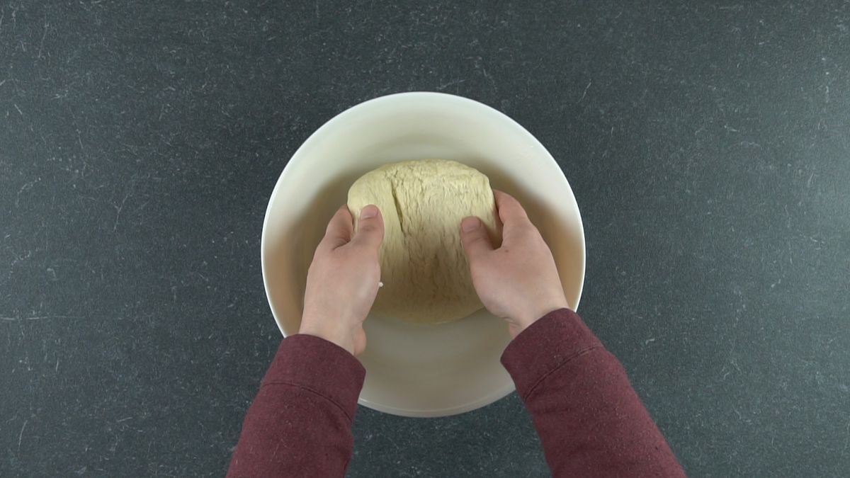dough in large white bowl
