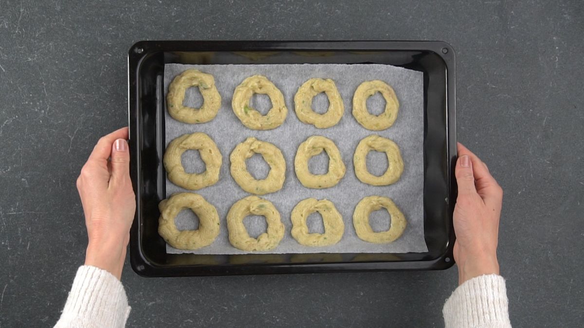 baking sheet of chicken rings before cooking