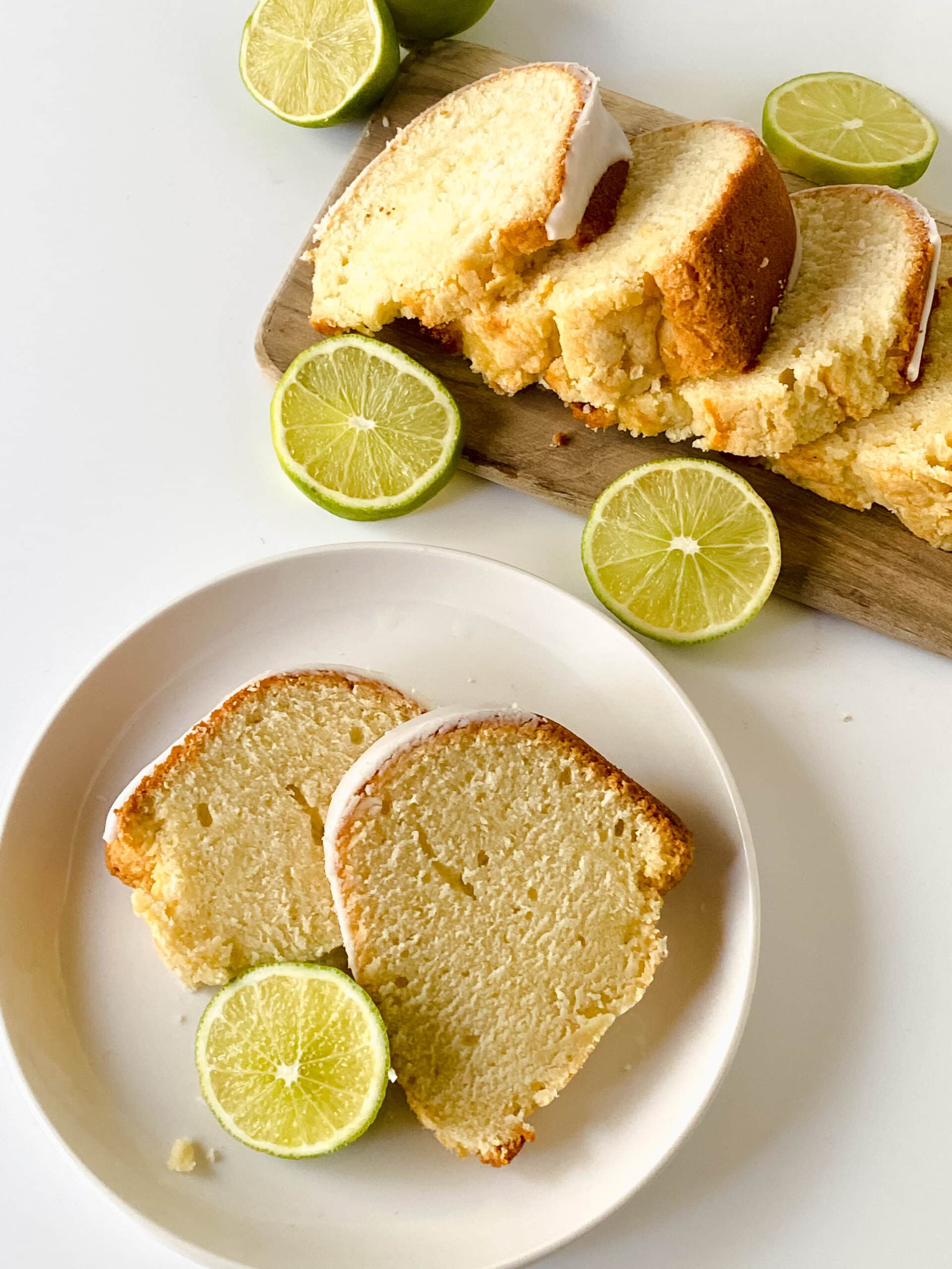 white plate with two slices of key lime pound cake