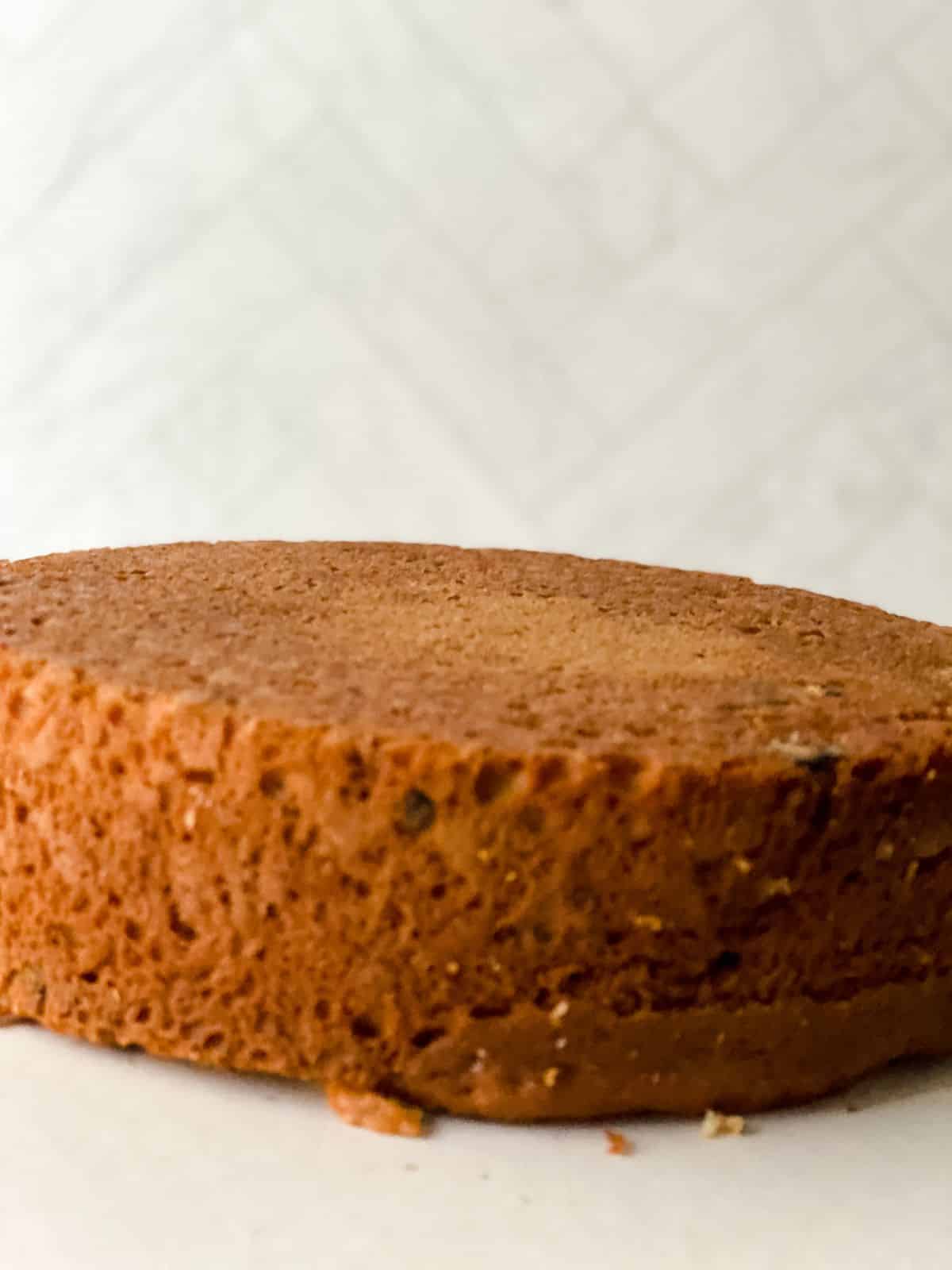 baked cake with white brick background