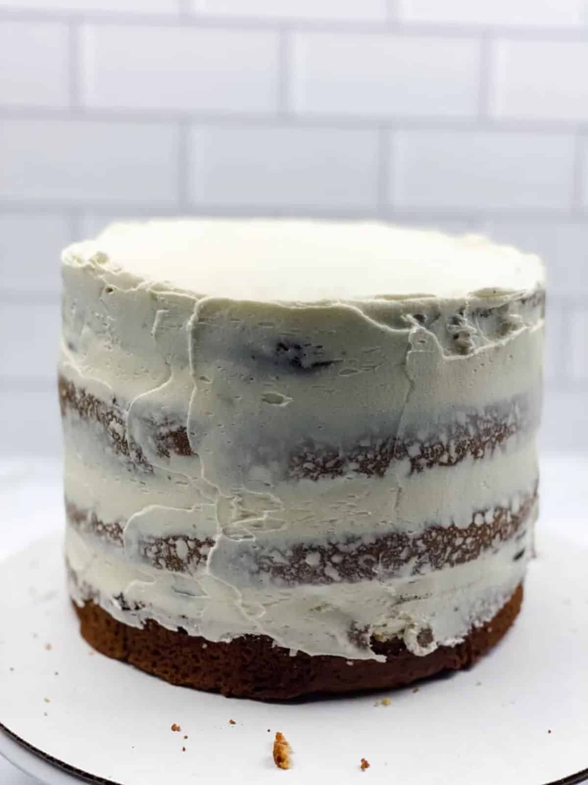 crumb coat on four layer cake