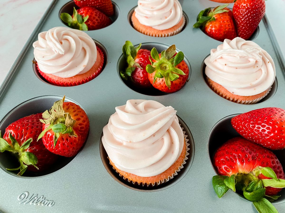 cupcakes and strawberries in baking tin