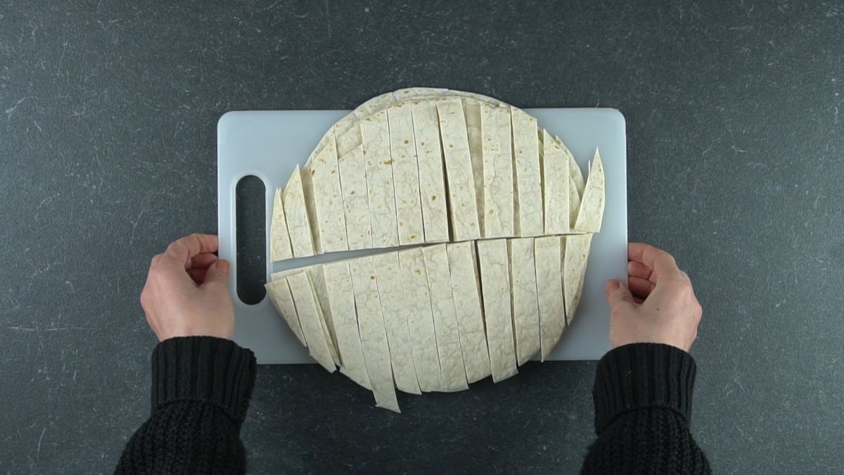sliced tortillas on white cutting board