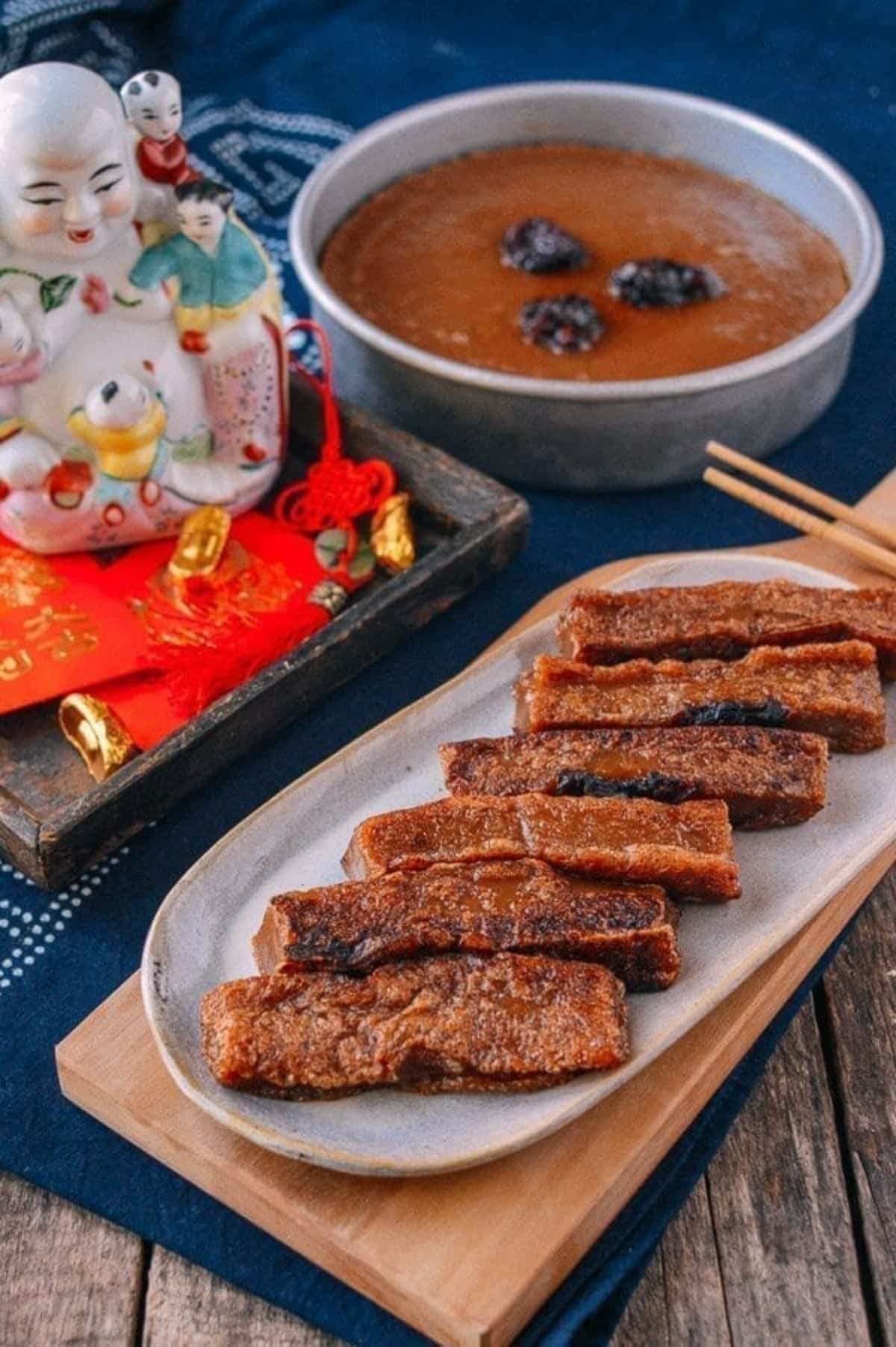 Nian Gao (Chinese New Year Sweet Rice Cake) sliced on a tray.