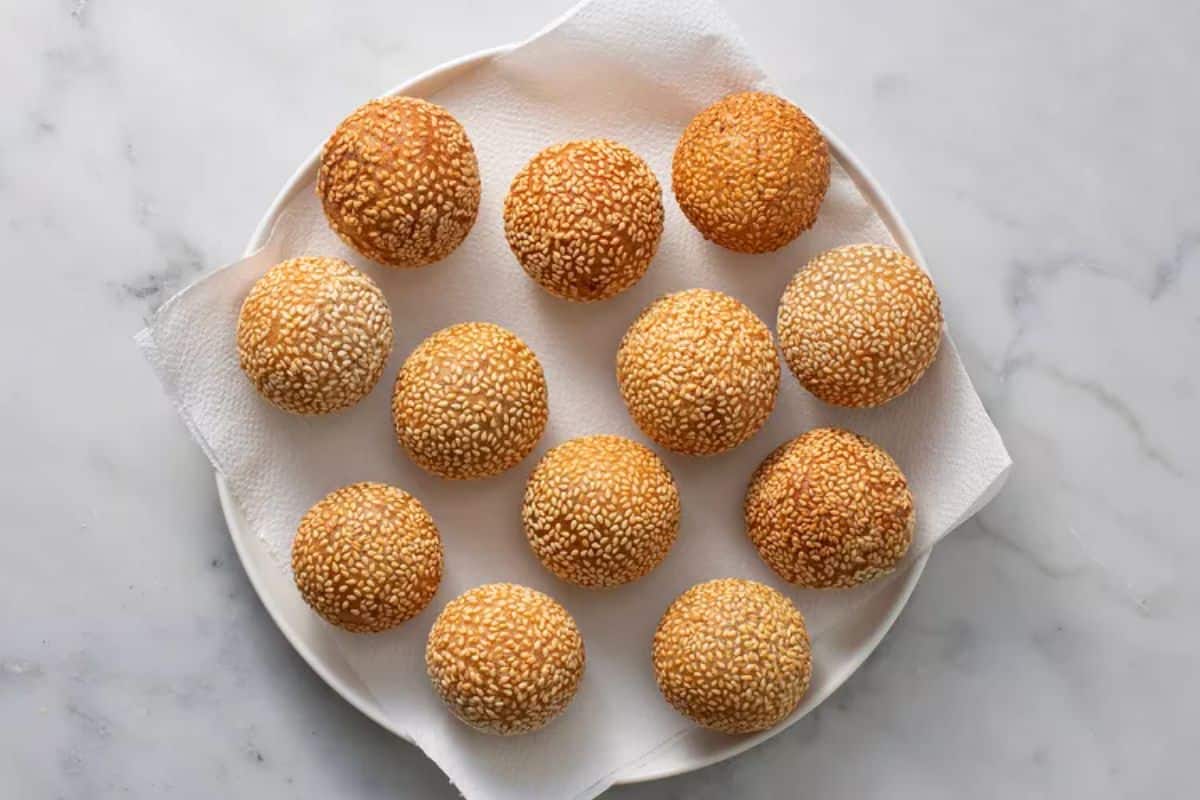 Jian Dui (Sesame Seed Dessert Balls) on a white plate.