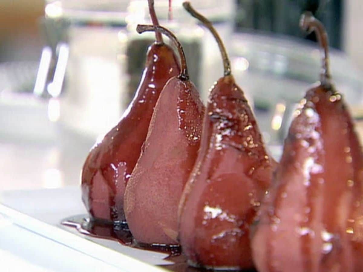 Red-Wine Poached Pears on a glass tray.