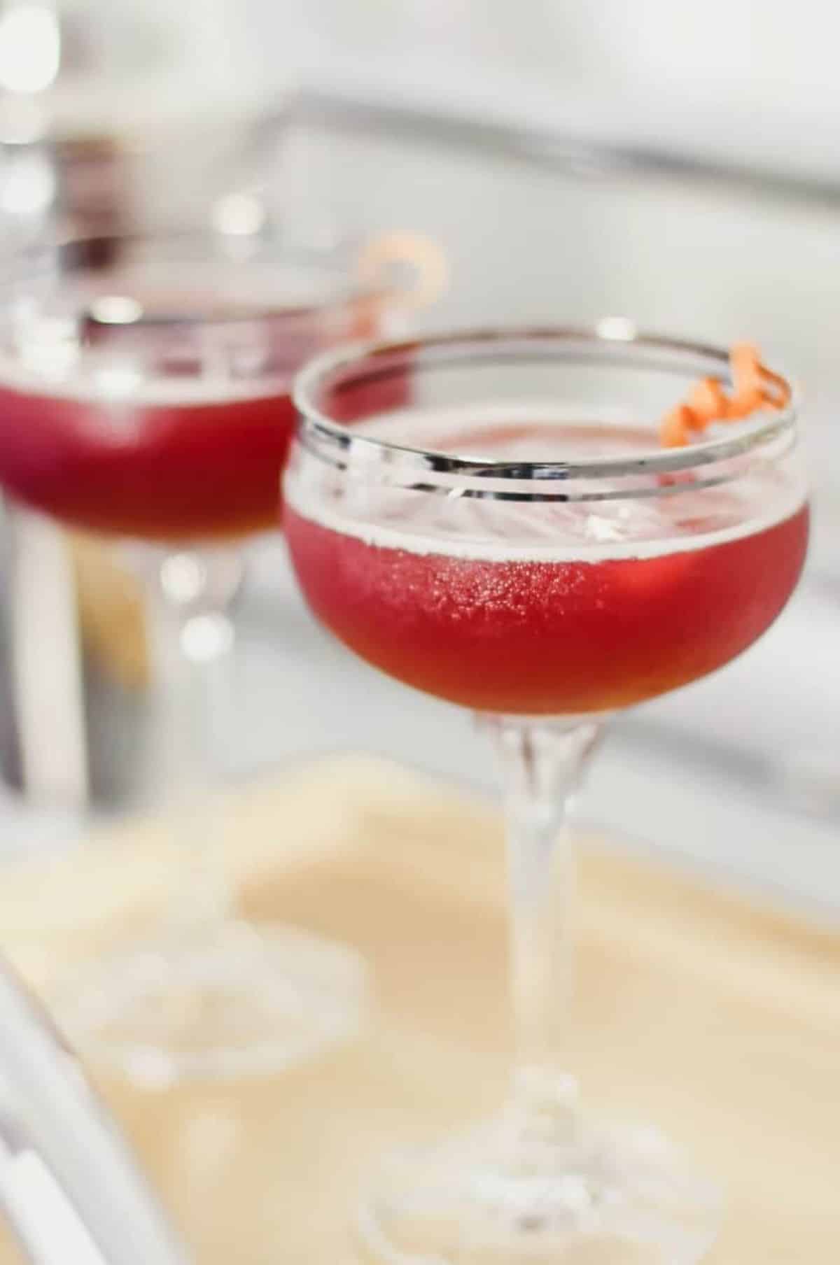 Pomegranate Hula Breeze ging coctail in tall glass cups.