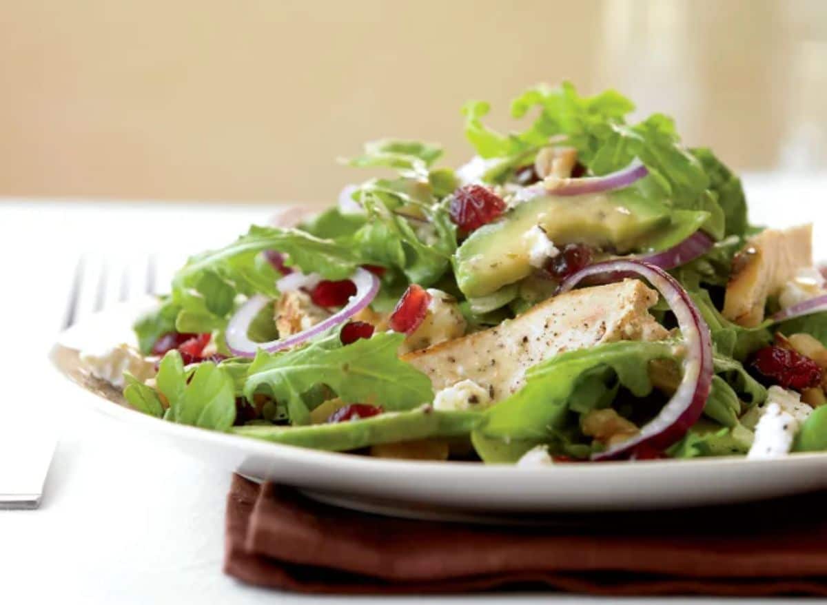 Chicken and Avocado Salad on a white plate.